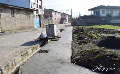 عملیات عمرانی احداث پیاده رو در کوچه شالیزار