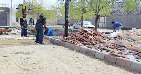 عملیات کف سازی و جدول گذاری بوستان یاس