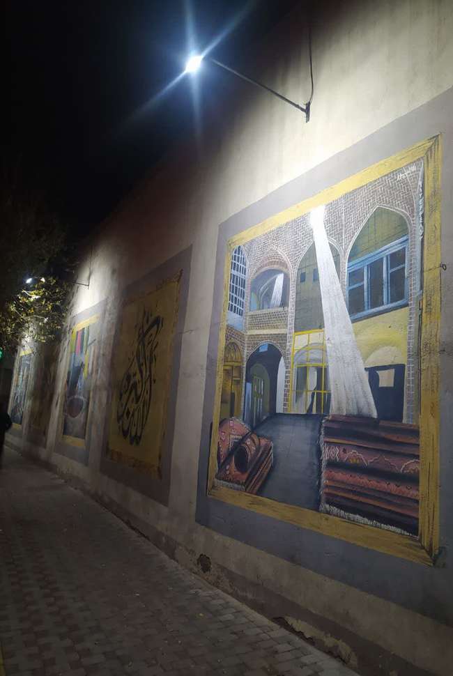 نصب سیستم نورپردازی بر تصاویر شهدا در پل قاری